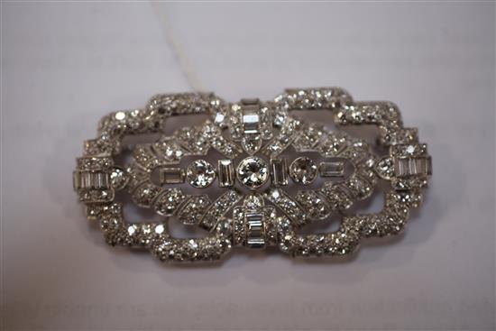 A 1930s Art Deco platinum and diamond tablet brooch, in fitted box.